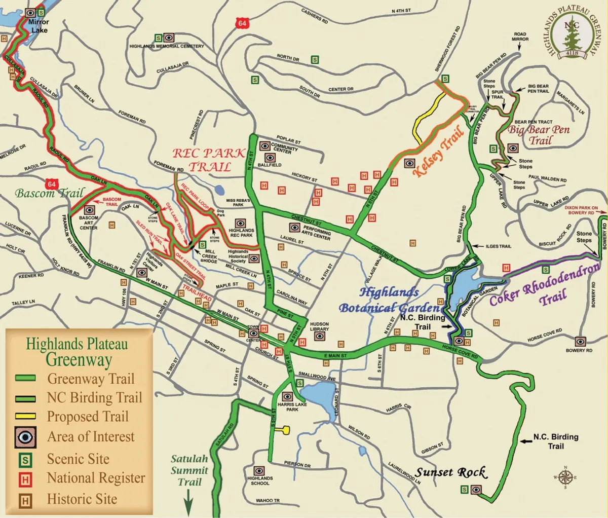 A detailed exterior view featuring the Highlands Plateau Greenway and Highlands Botanical Garden, with color-marked trails winding through lush greenery. The scene invites exploration, with signage and clear pathways encouraging visitors to embark on an outdoor adventure. The area is surrounded by natural flora, offering a taste of the region’s biodiversity.